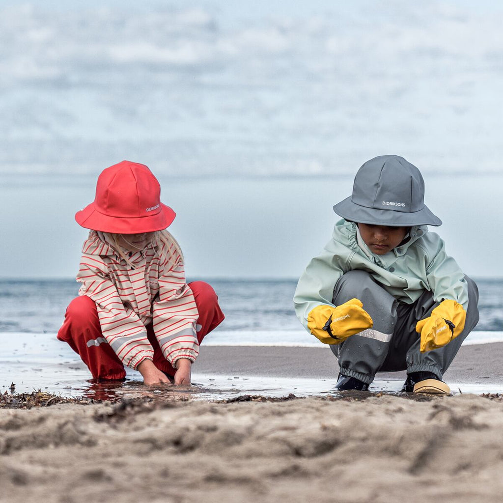 Didriksons Dětský klobouk do deště Southwest factory blue