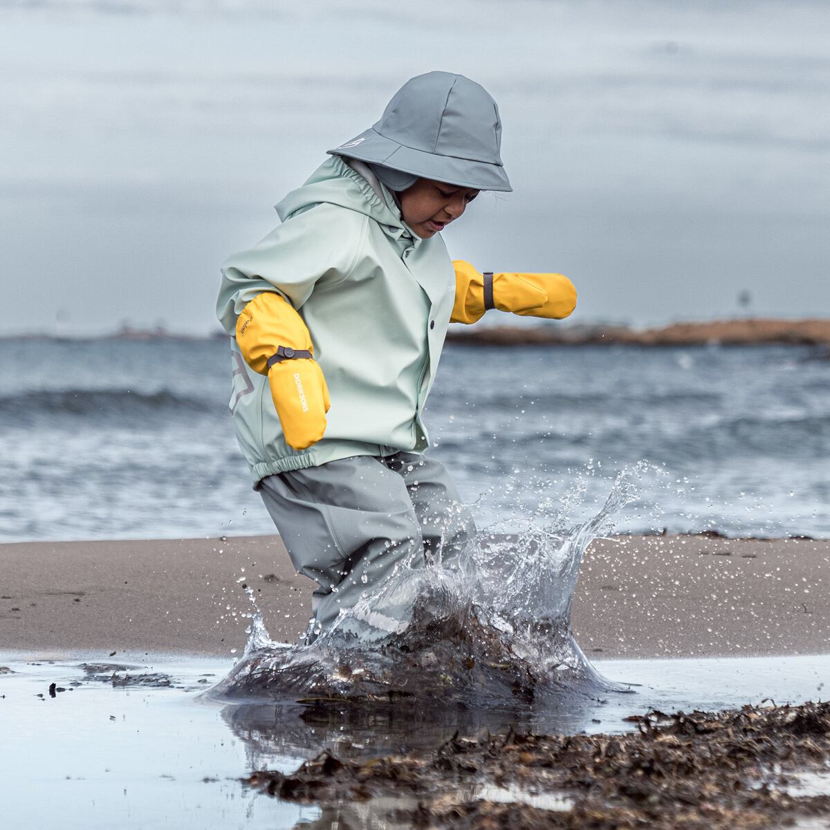 Didriksons Dětský klobouk do deště Southwest factory blue